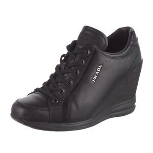 Prada Black Leather Wedge Sneaker - Women's
Comes with box and dust bag.
